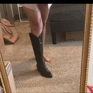 Knee high black cowboy boots